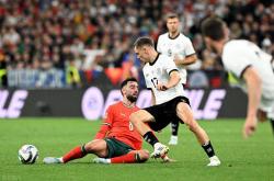 开云体育入口-葡萄牙队逆转战胜德国队，挺进决赛